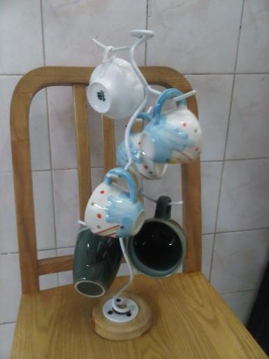 Coffee cup hanger 